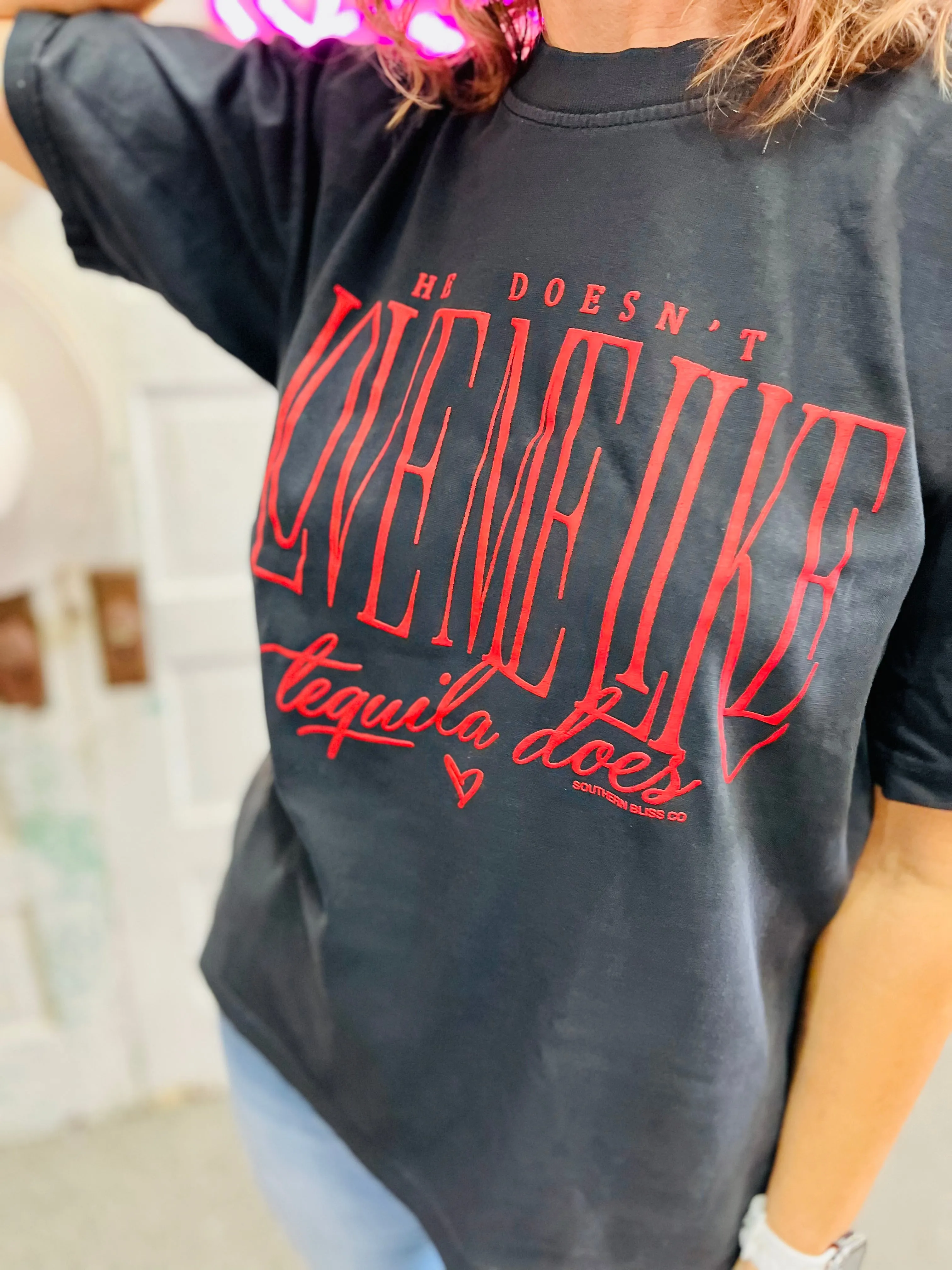 He doesn’t love me like tequila does black tee
